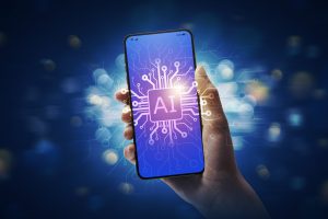 User holding a smartphone and AI chip on the screen: Artificial Intelligence and mobile technology concept